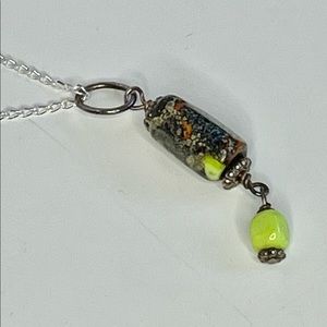 24” sterling silver chain with hand blown brown & green beads. New 1 of a kind